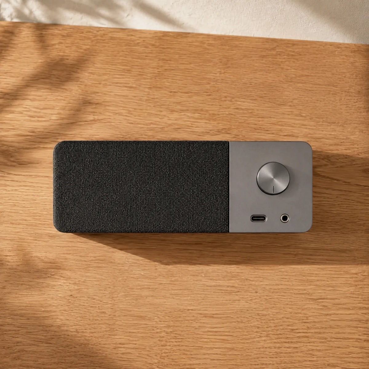 Desk Speaker — top-down flat lay view