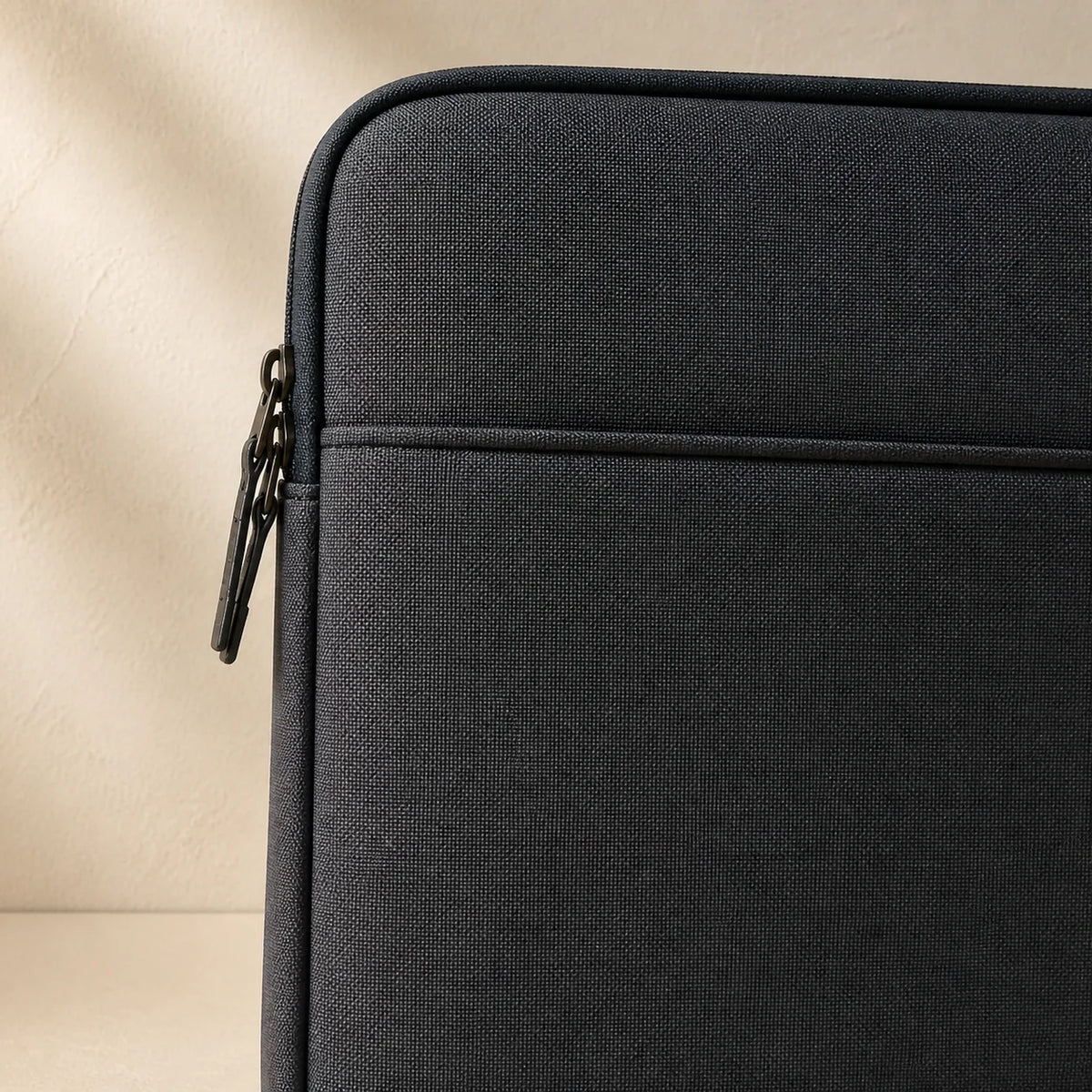 16" Laptop Sleeve — close detail: Water-resistant 600D shell