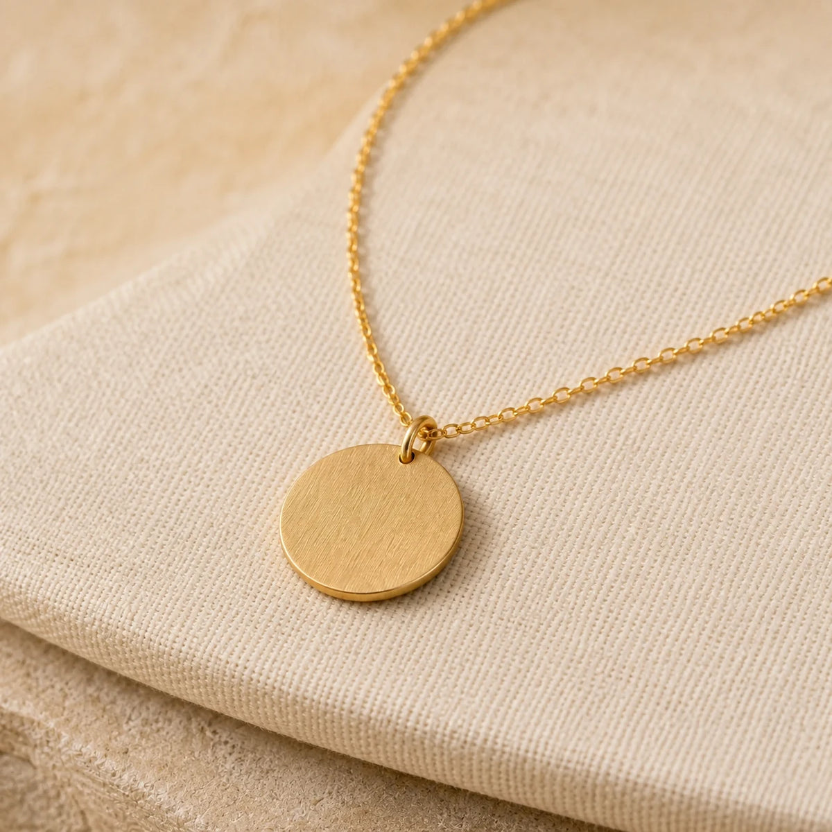14K Disc Pendant in Yellow gold — close detail: Solid 14K gold
