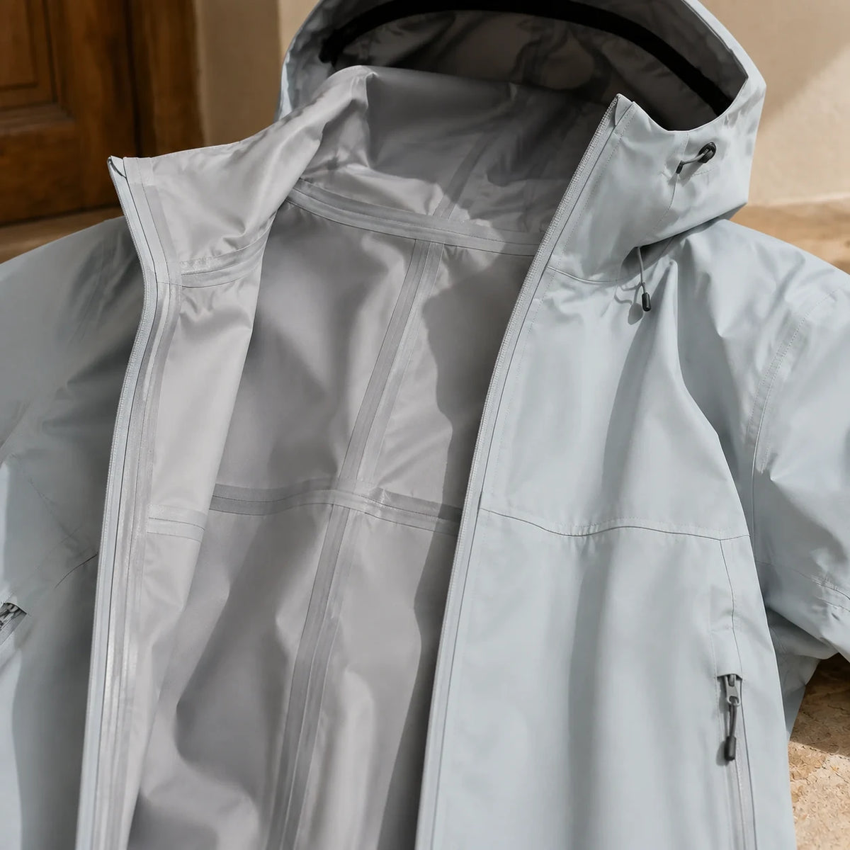 3L Shell in Glacier — close detail: Fully taped seams