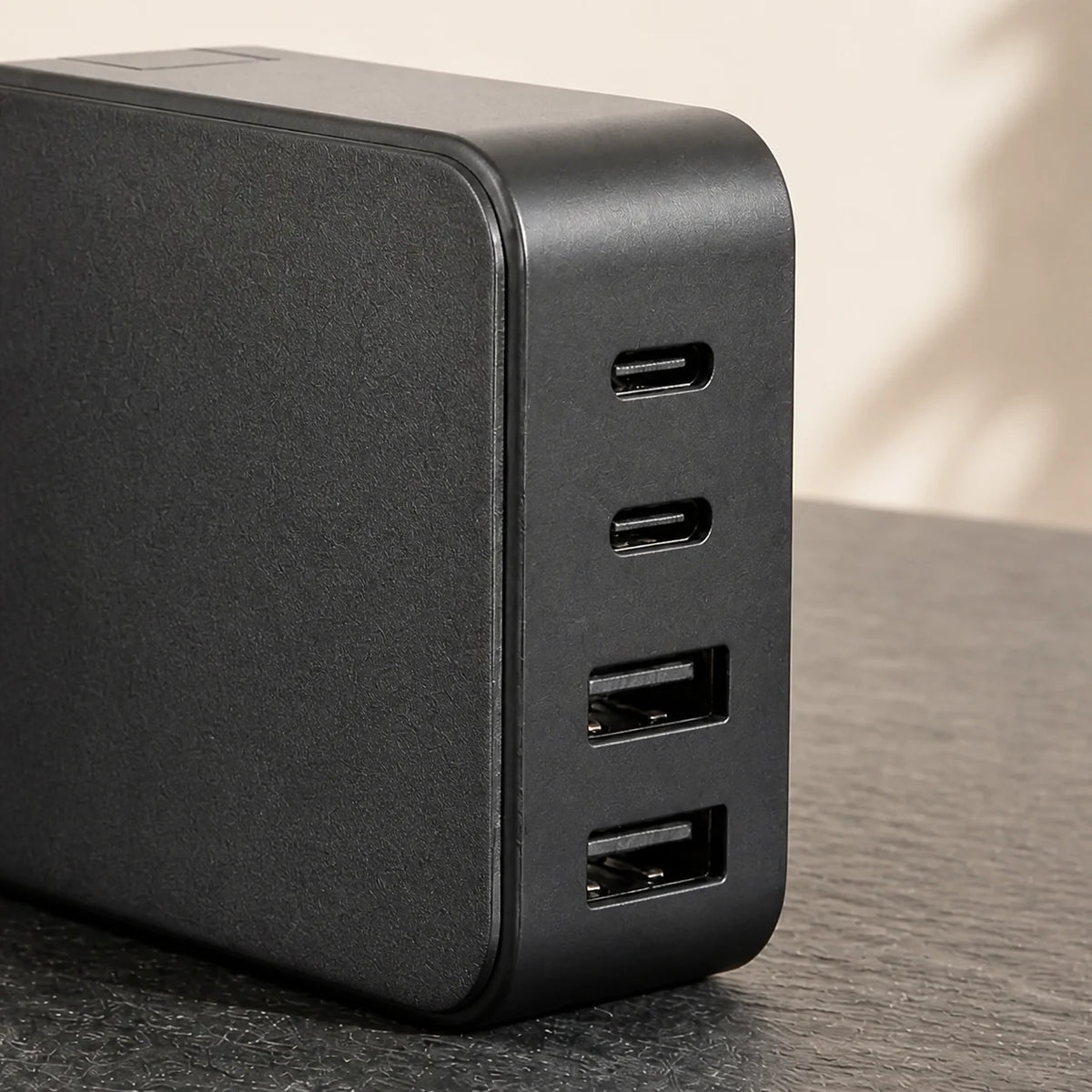 100W GaN Charger — close detail: 100W total across four ports